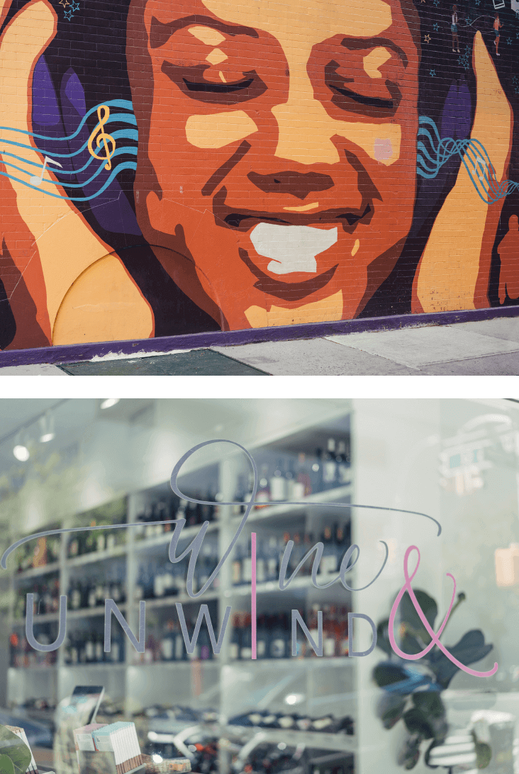 Neighborhood street art mural and wine shop in Hamilton Heights NYC.